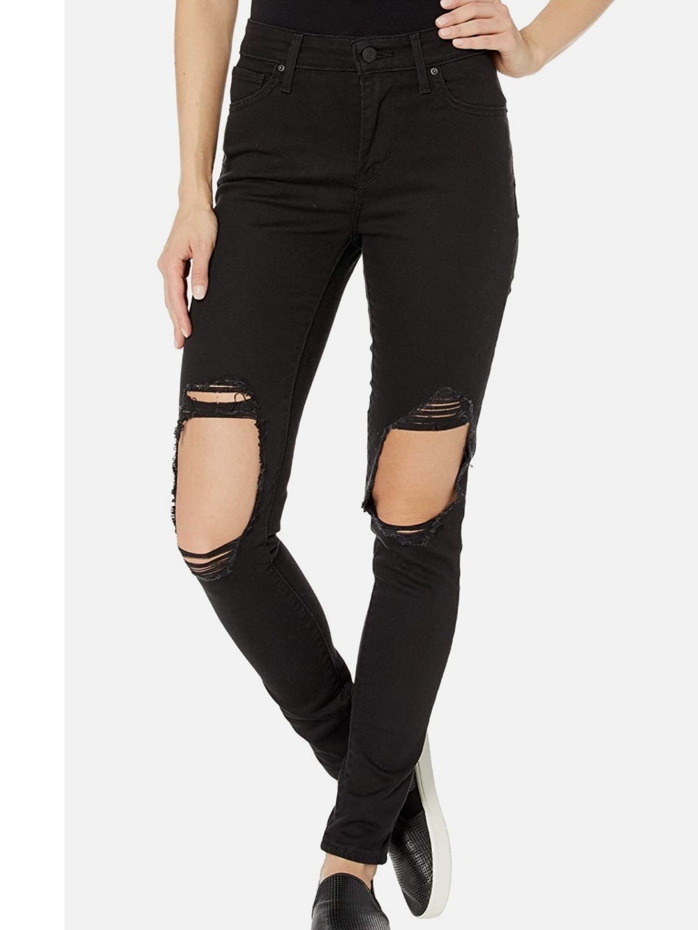 Levi's 721 High-Rise Skinny jeans featuring distressed knees.